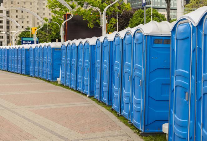 a row of portable restrooms at an outdoor special event, ready for use in Bethesda